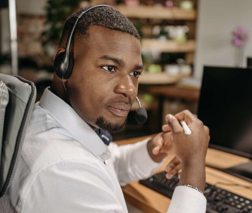 young black man in tech mascot insurance brokers contact