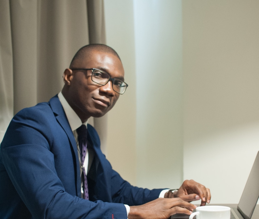 young black man in tech mascot insurance brokers contact